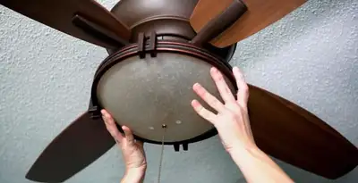 Ceiling fan repair and reinstallation on ceiling mount in Wilmington, NC