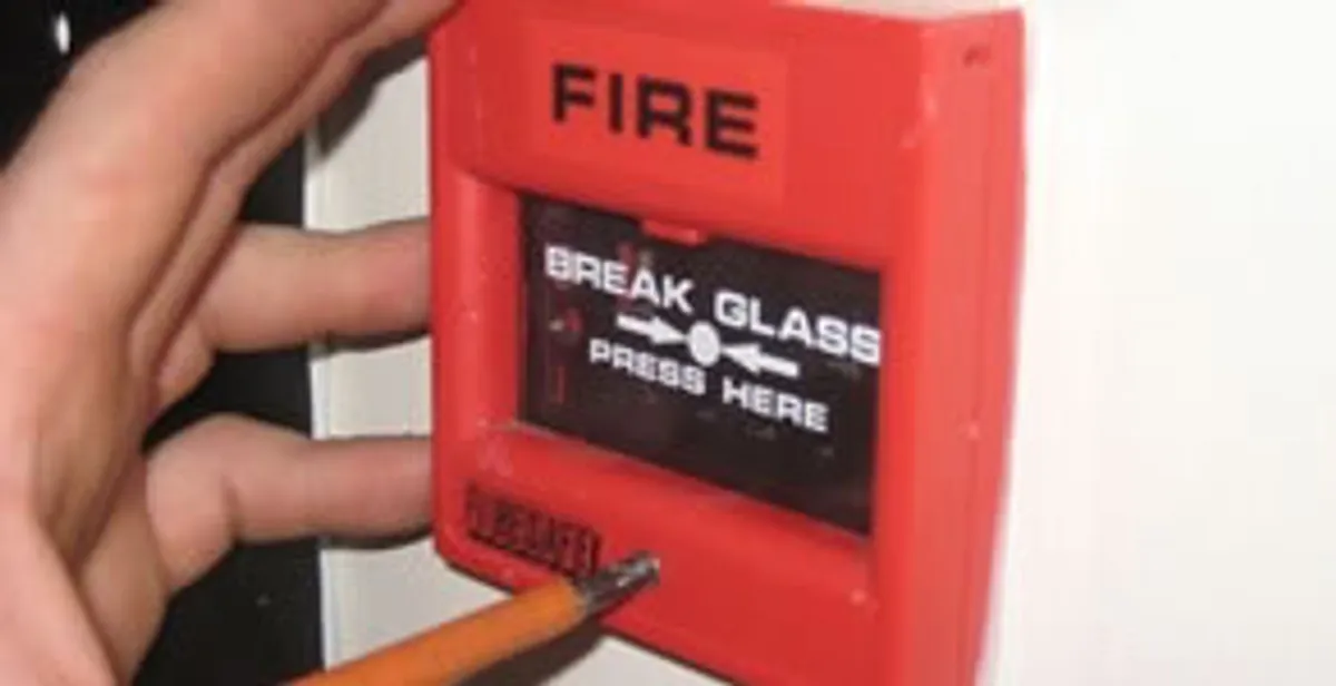 fire alarm installation service showing manual fire alarm pull station installed by licensed electricians in Wilmington, NC