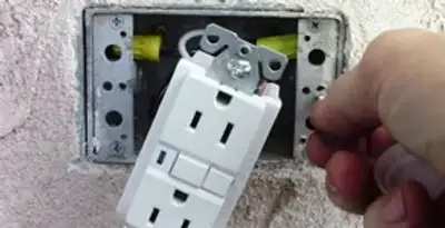 gfci circuits service showing installation of a ground fault circuit interrupter outlet by licensed electricians in Wilmington, NC