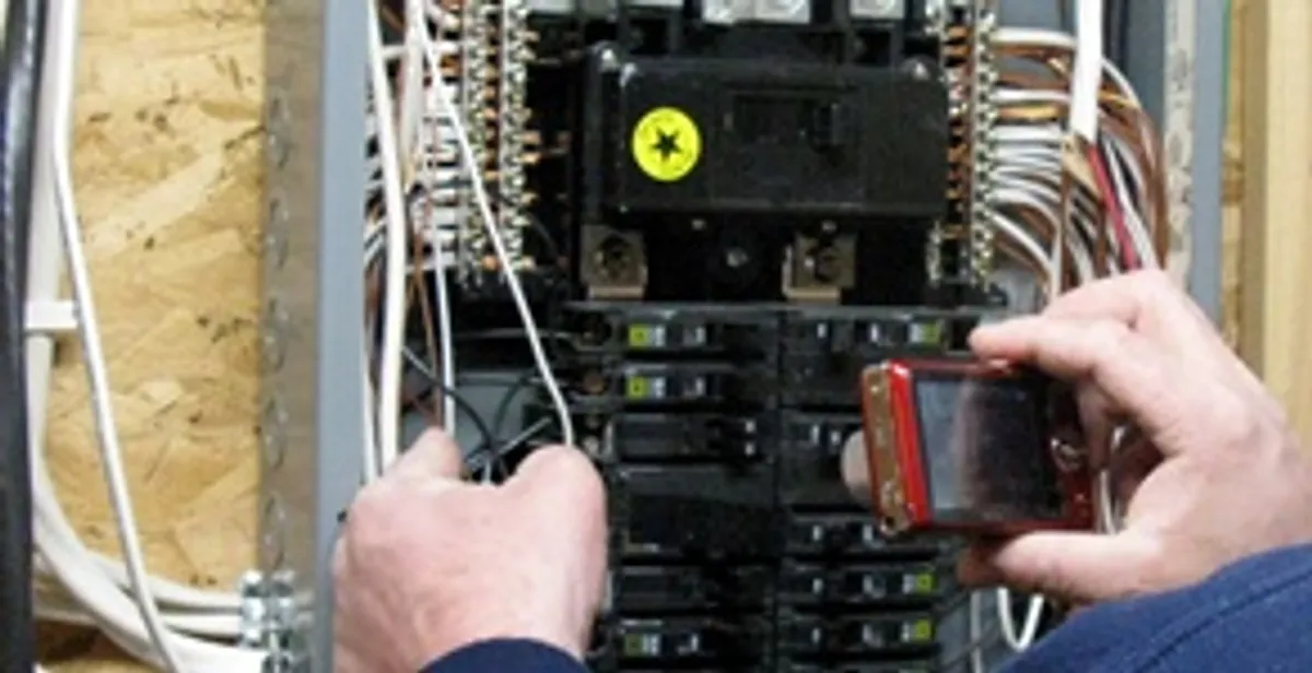 Home electrical inspection of circuit breaker panel by licensed electrician in Wilmington, NC