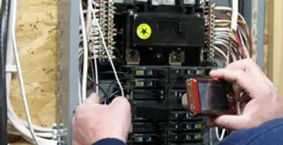 Home electrical inspection of circuit breaker panel by licensed electrician in Wilmington, NC