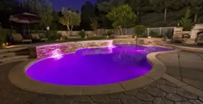 pool light installation and repair services illuminating a residential swimming pool in Wilmington, NC