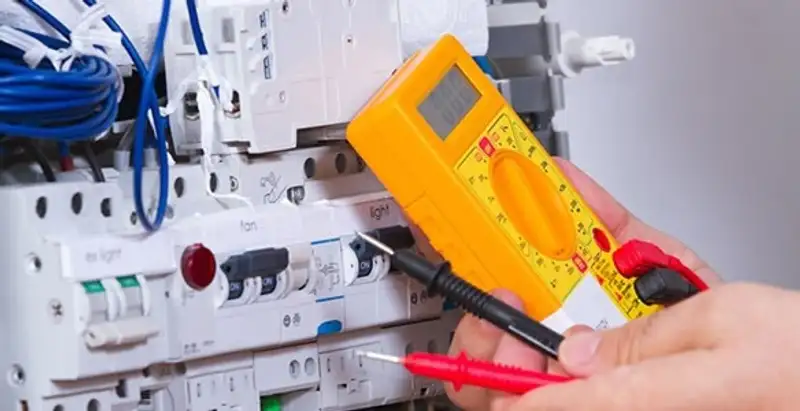 Residential electrician testing home electrical panel for safety and performance in Wilmington, NC