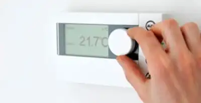 Thermostat installation service with professional adjusting temperature control in Wilmington, NC